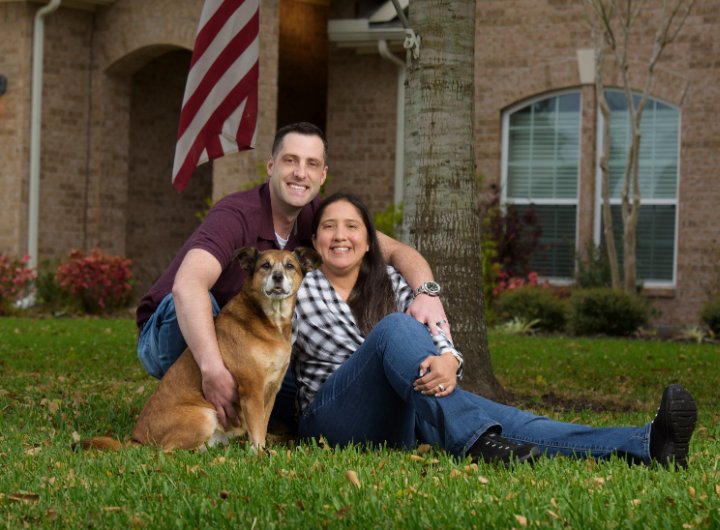 Couple Posing with Dog